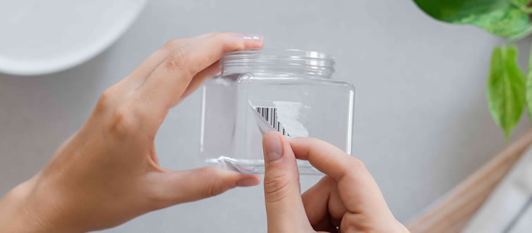 What's the cleverest trick to peel an annoying sticker off glass?
