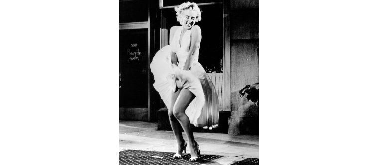 That breezy white dress over a New York subway grate.
